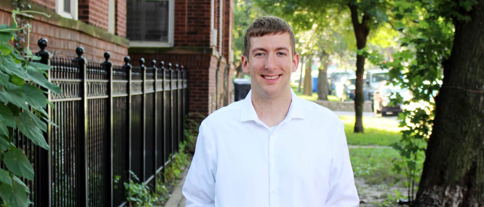 MSU Broad Master's in Accounting grad Michael Taravella smiling on a sunny sidewalk.