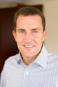 Professional headshot of Greg Longstreet, Broad alumnus and CEO of Del Monte Foods