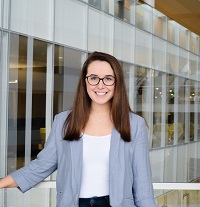 Professional image of Claire Murray (B.A. Hospitality Business '20) in the Minskoff Pavilion.