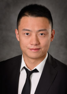 A professional headshot of Yang Fu (M.S. Business Analytics '19)