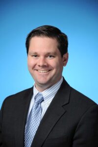 Professional headshot of Adam Covington (B.A. Hospitality Business ’02), vice president of hospitality and strategy with Levy Restaurants