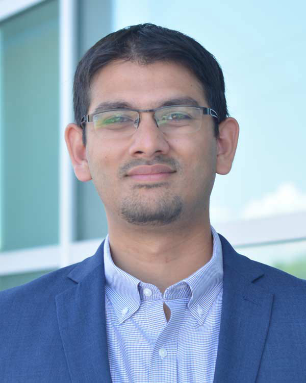Professional headshot of Musaib Ashraf, assistant professor of accounting and information systems