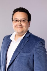 Professional headshot of Carlos Valderrama, LLamasoft senior vice president of customer success