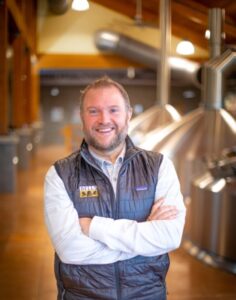 Matthew Moberly (MBA ’07), vice president of sales and marketing at Bell’s Brewery, picture inside the brewhouse