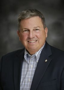 Headshot of Daniel Wolf (B.A. Marketing ’76, MBA ’77) is the president and CEO of Dewar Sloan