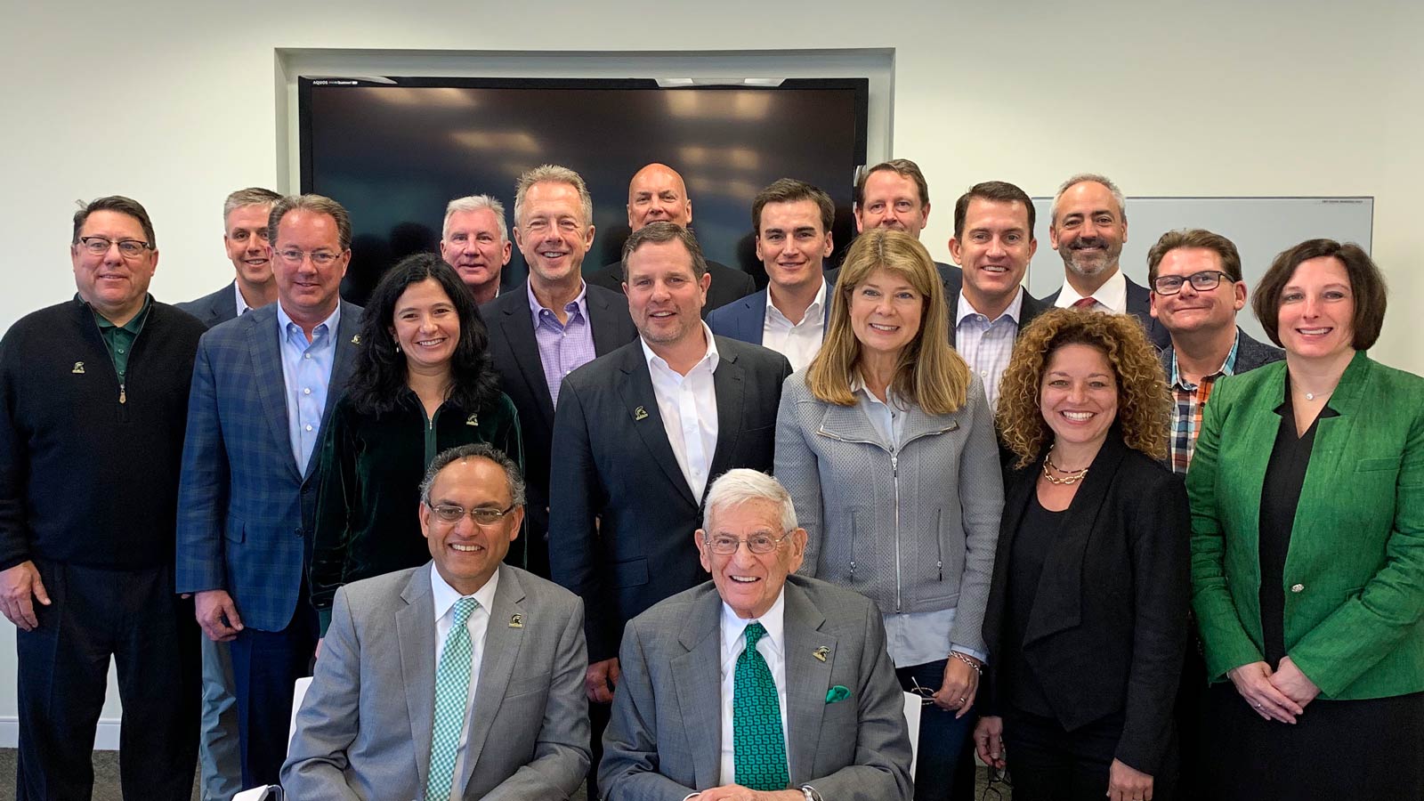Eli Broad sits for a photo with the Broad College Advisory Board in Los Angeles in 2019.