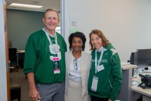 Jim and Kris Gerish pictured with Authella Collins Hawks outside the Student and Industry Resource Center inside the Eppley Center.